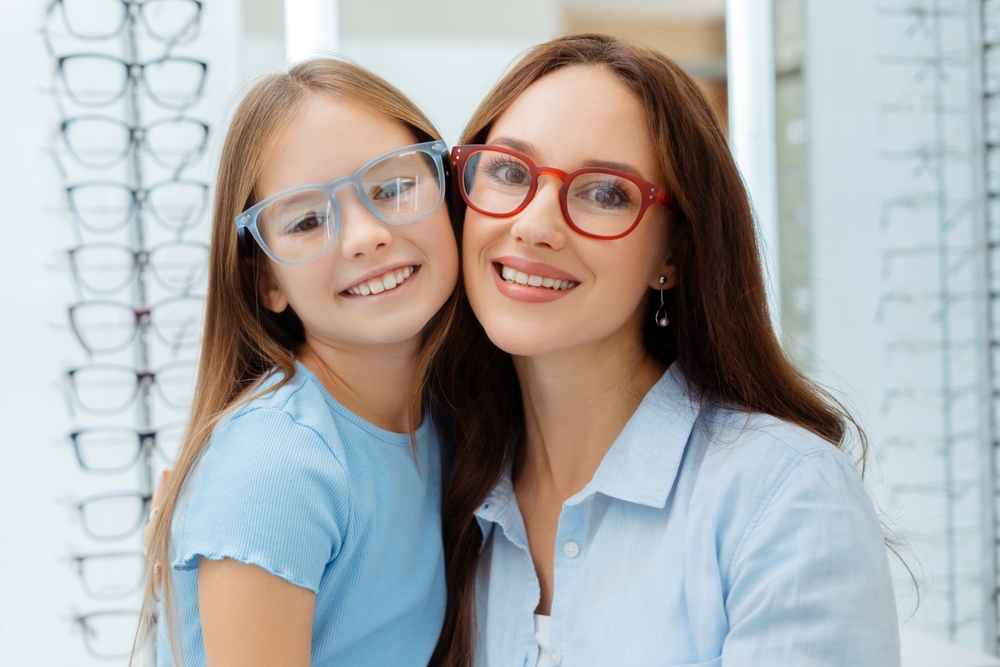 Man wearing stylish prescription glasses with clear vision - IC Laser Eye Care